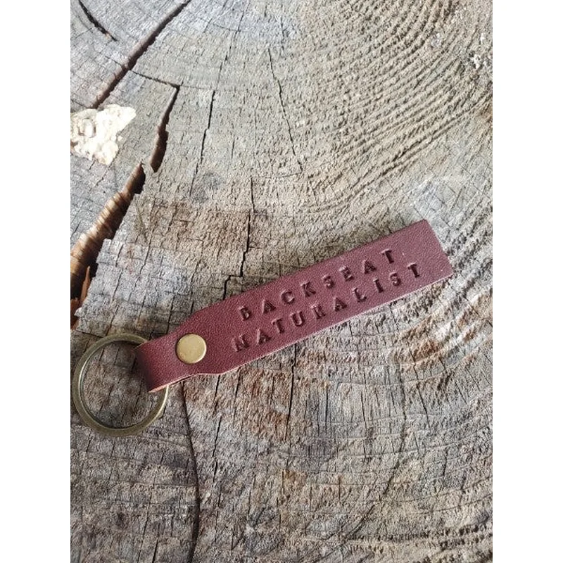 ‘Backseat Naturalist’ Stamped Leather Keychain
