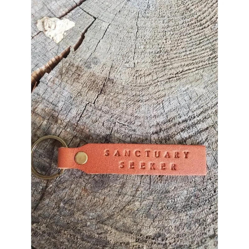‘Sanctuary Seeker’ Stamped Leather Keychain